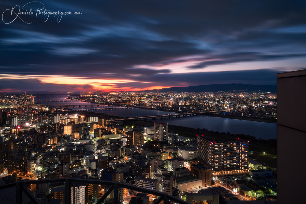 Japan -Osaka -View at sunset with bridges over Yodo River from the top of Umeda Sky Building